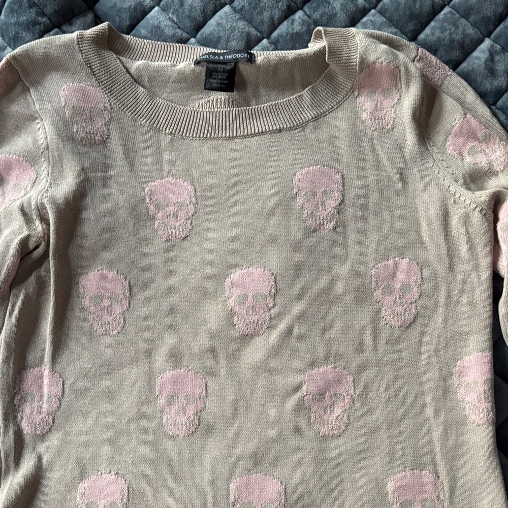 Chelsea & Theodore Beige Sweater with Pink Skull Design